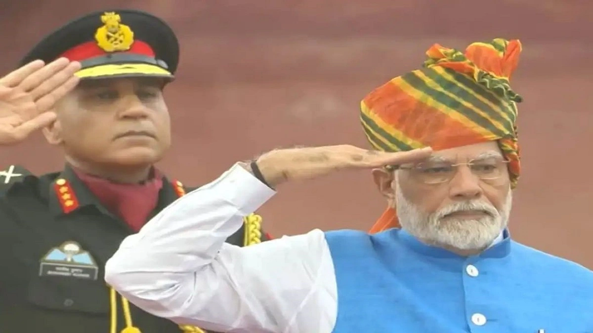 Narendra Modi saluting alongside another man