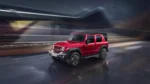 Mahindra Thar ROXX in red color, showcasing its rugged design and off-road capability